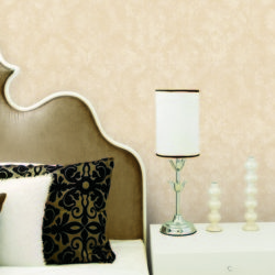 bedroom with beige damask wallcovering
